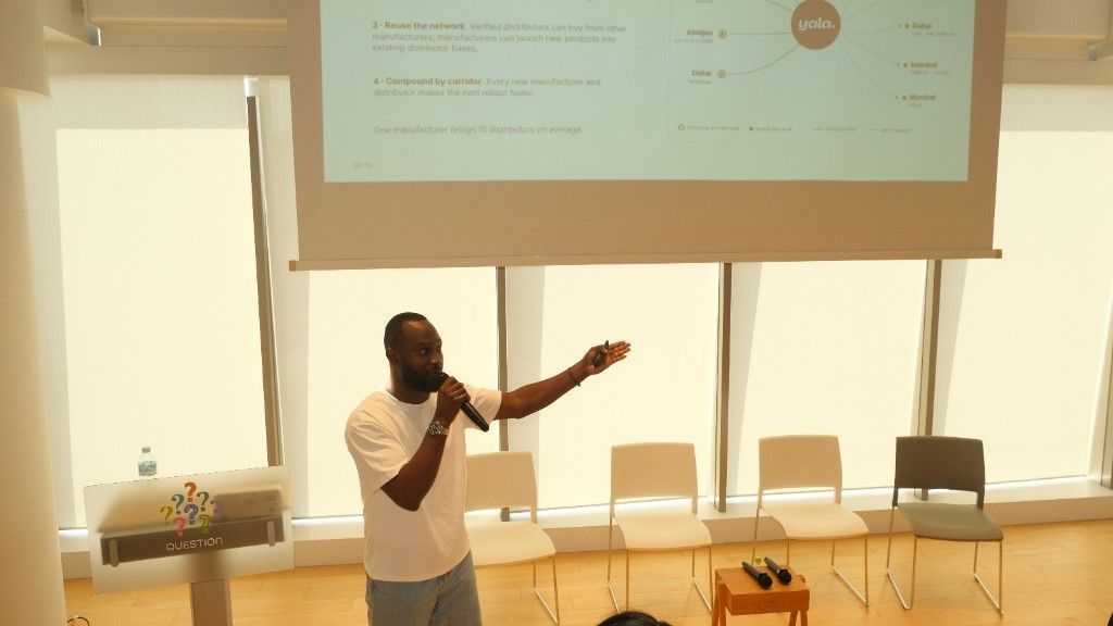 Babatunde presenting the Yala Trade Desk in Kyoto