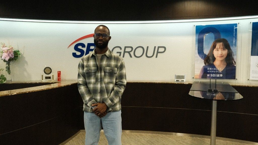 Babatunde Adebajo at the SBI Group offices in Japan